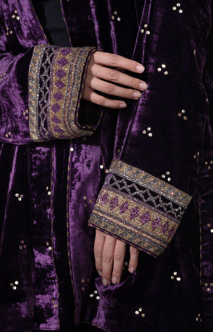 Embroidered velvet cuff detail